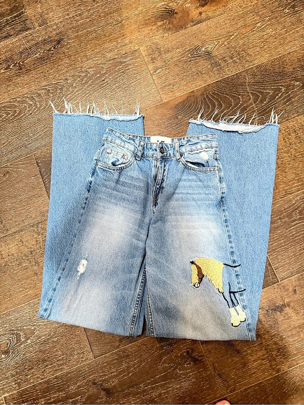 Understated Leather Blue Denim Horsey Jeans Distressed Straight Leg Jeans in